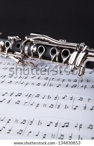 Close-up Photo Of Clarinet And Musical Note