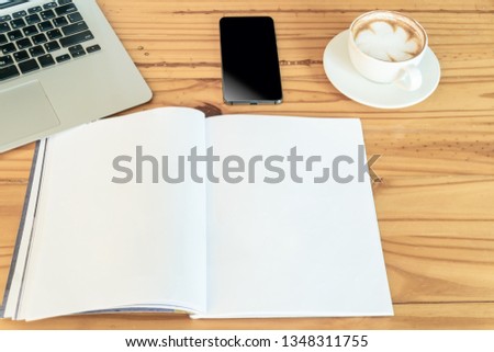 Office  table with laptop, smartphone, cup of coffee. Top view with copy space