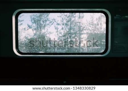 Broken Window in a Train