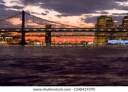 Hudson River, Lower Manhattan, Brooklyn Bridge, Manhattan Bridge and the Statue of Liberty in the Distance, New York