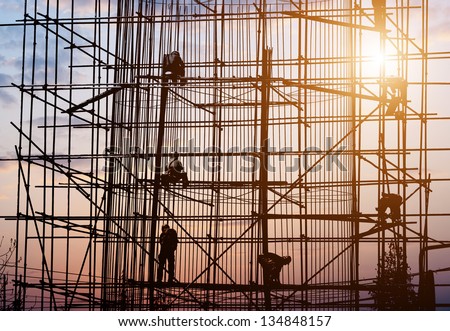 construction workers in the sunset