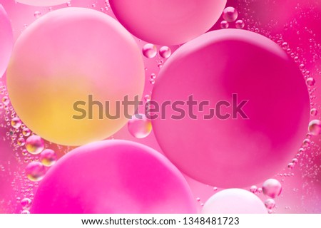 Pink creative abstract background with mixed bubbles.