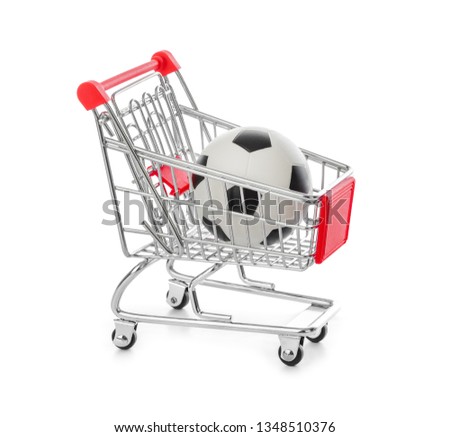 Soccer ball in shopping cart isolated on white background