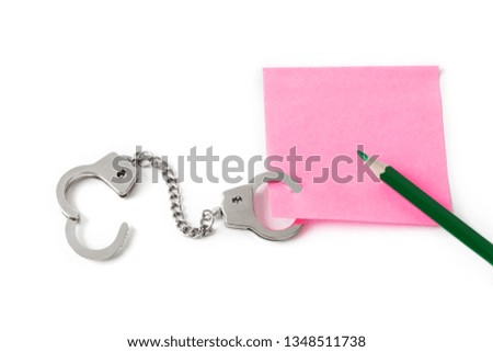 Blank paper with handcuffs isolated on white background