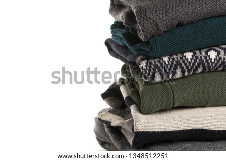 different knitted sweaters on a isolated background
