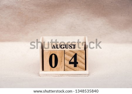 August 4th. Image of August 4 wooden color calendar on white canvas background. empty space for text