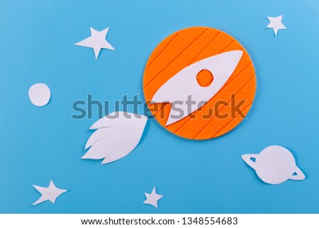Space shuttle taking off on a mission. paper cut