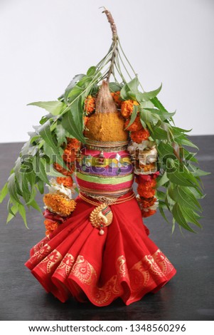 decorative kalash with coconut and leaf with floral decoration