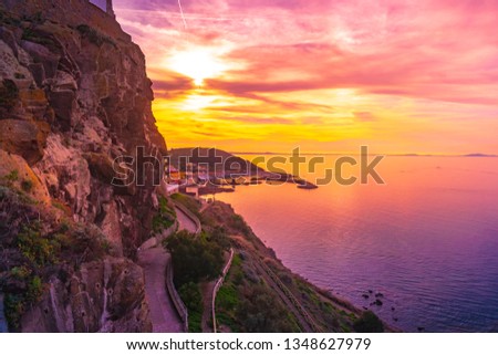 Beautiful alley of Castelsardo old town - Sardinia - italy. Colorful photo of gorgeous purple sunset in Sardinia island..