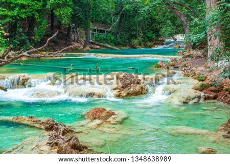 Chiflon Waterfalls with clear blue water in sunny day, Chiflon Cascades, Chiapas, travel in Mexico