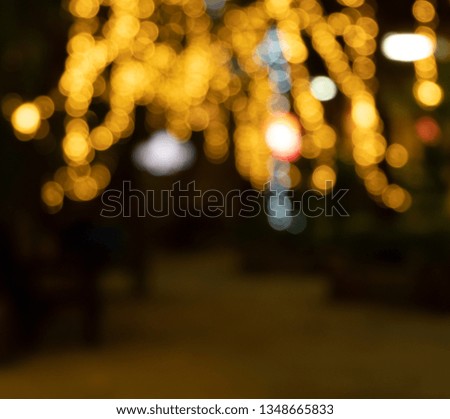 decoration glitter gold light Christmas celebration hanging on tree, abstract image unfocused for blurred background