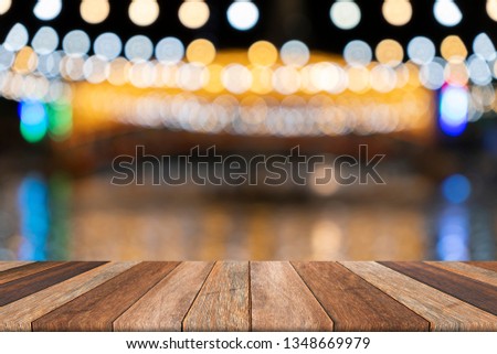 Empty wooden table and blurred background, used for presentation product and advertising