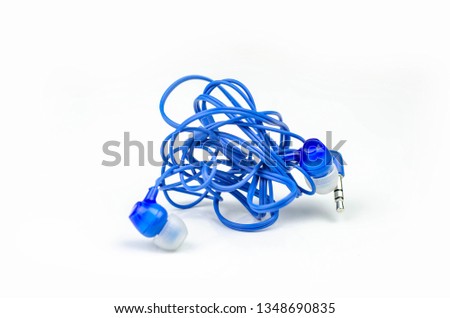 tangled blue no brand earphones isolated on white