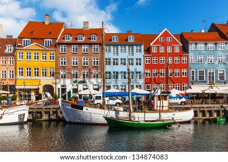 Scenic summer view of color buildings of Nyhavn in Copehnagen, Denmark Royalty-Free Stock Photo #134874083