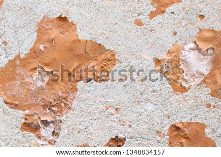 Close up high resolution surface of aged and weathered paint on walls in germany