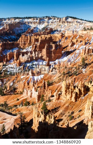 Vertical view of snow between the rock formations at Bryce Canyon National Park, Utah, USA