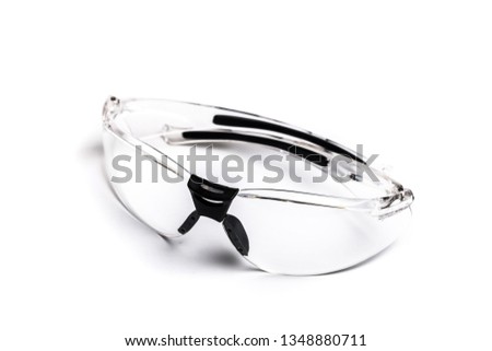 plastick safety glasses for construction work isolated on white backdround 
