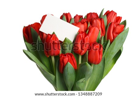 Blank card on a bouquet of red tulips isolated on white background.