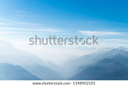 Swiss Alp mountaintops and clear blue sky. 