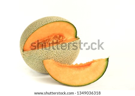 Whole and slice of Japanese melons,honey melon or cantaloupe (Cucumis melo) with seeds isolated on white background. Royalty-Free Stock Photo #1349036318