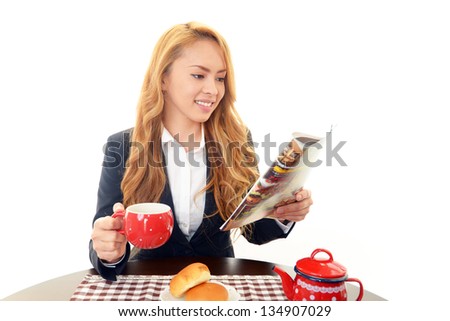 Businesswoman eating meals