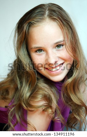 A Cute Teenage Girl Of 12 Years Old Smiling At The Camera Images