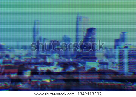 View of modern buildings and cityscape background with digital glitch effect
