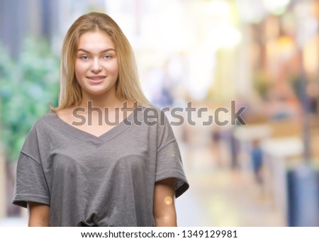 Young caucasian woman over isolated background with a happy and cool smile on face. Lucky person.