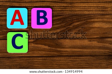abc alphabet on a wooden table