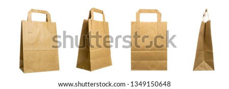 Kraft grocery paper bags isolated on a white background, rotational, all sides view
