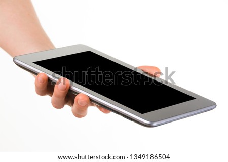 Side view of relaxed hand holding beautiful modern blank screen smartphone in a palm isolated on white background. Detailed closeup studio shot