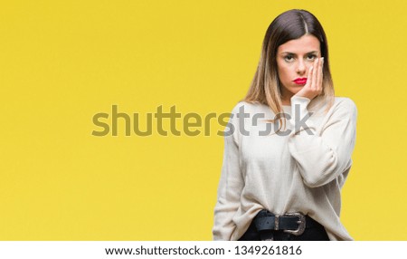 Young beautiful woman casual white sweater over isolated background thinking looking tired and bored with depression problems with crossed arms.