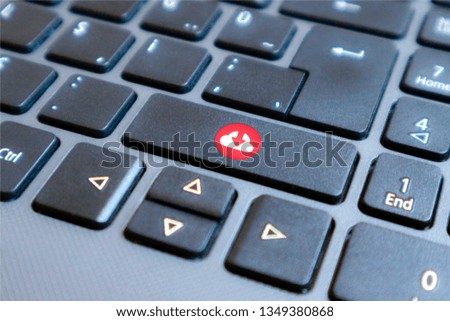 Download logo key on a black keyboard closeup. Concept image Downloading.Download concept                                                                                           