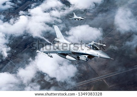Fighter Jets in sky Royalty-Free Stock Photo #1349383328