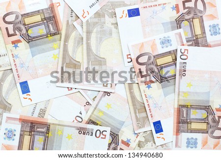 fifty euro banknotes scattered on the floor