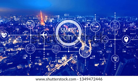 Smart city concept with aerial view of Tokyo, Japan at night