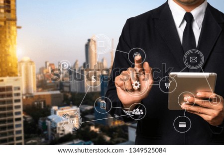 Data Management System with businessman working with provide information for Key Performance Indicators and marketing analysis virtual computer 