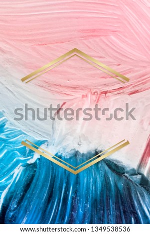 Gold hexagon frame on a pink and blue paintbrush stroke patterned background vector