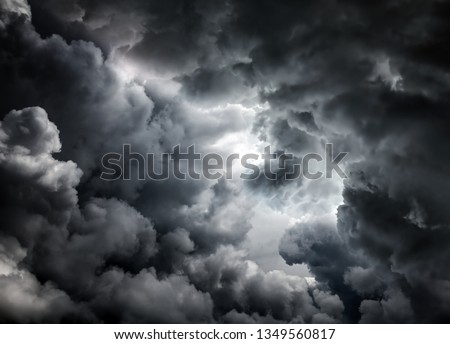 Dark and Dramatic Storm Clouds Area Background Royalty-Free Stock Photo #1349560817