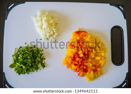 chopped or minced bell pepper, parsley and onion prepared for tacos. health dinner.