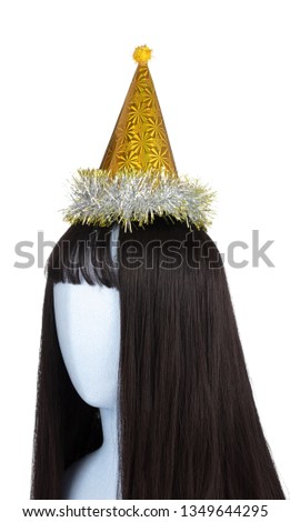 Yellow of party hat on mannequin head isolated on white background
