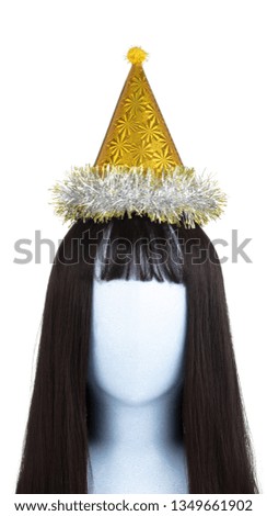 Yellow of party hat on mannequin head isolated on white background