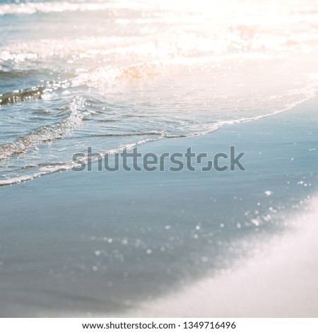 Summer sand beach and seashore waves background. Defocused blurred square holiday vacations concept backdrop for motivational quotes, blog posts, your text