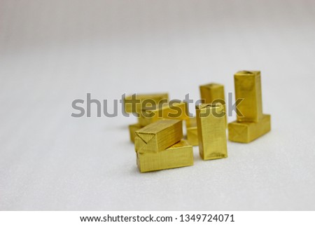 Golden cubes on white