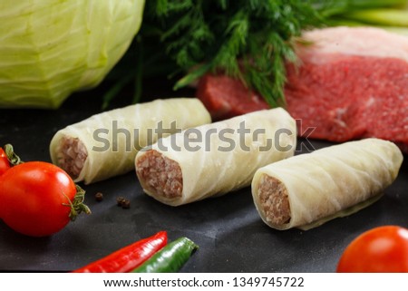 raw Cabbage rolls stuffed with meat