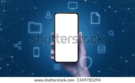 Phone mockup in hand surrounded with computing icons and metwork threads. Binary code in background.