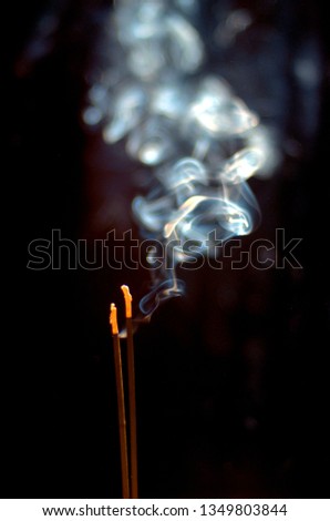 Abstract smoke art photography design. Devotional, A joss stick, incense stick, Used in worships, stick which on burning, smells sweet with smoke. 