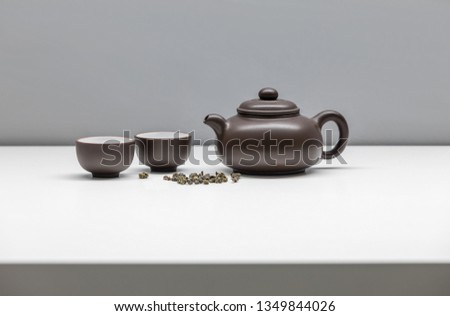 Сups and chinese kettle with tea. Part 10.
