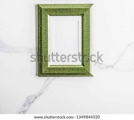 Modern feminine, artwork mock up, luxury design concept. Decorate with chic and style - Green photo frame on marble, flatlay