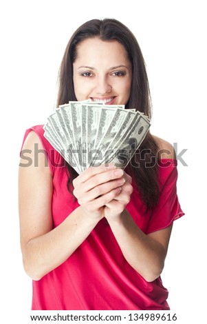 Portrait of pretty young smiling woman holding a dollar bills isolated on white background